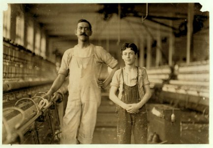 A mule-spinner and his assistant (Leopold Daigneau), Chace Cotton Mill, Burlington, Vt. May 7, 1909. LOC cph.3a26044
