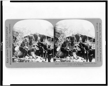 A native Filipino hut serves as quarters for this group of U.S. soldiers LCCN94509264 photo