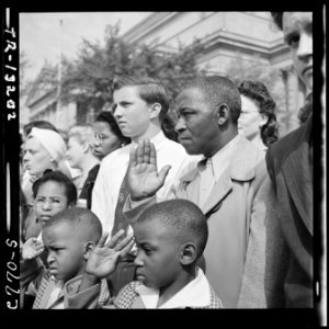 A nation's sorrow at the loss of President Franklin D. Roosevelt is reflected in the faces of thousands who lined the... - NARA - 520705