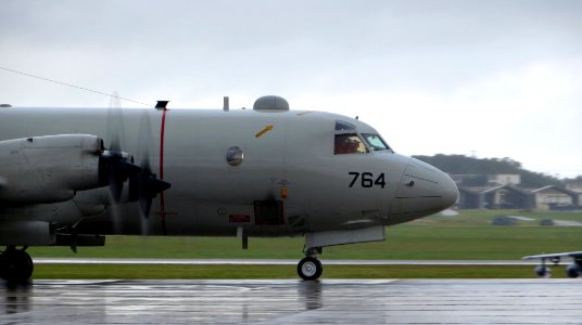 A P-3C Orion aircraft assists with Malaysia Airlines flight MH370 recovery efforts
