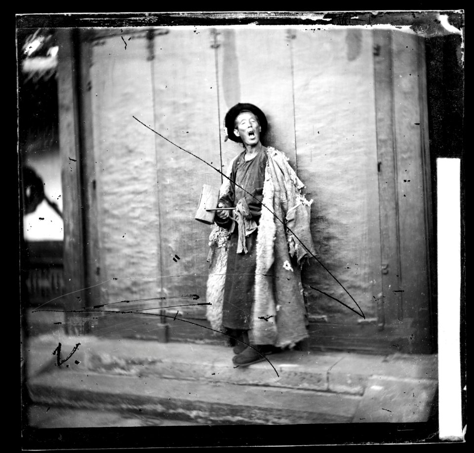 A nightwatchman, Peking, by John Thomson, 1869