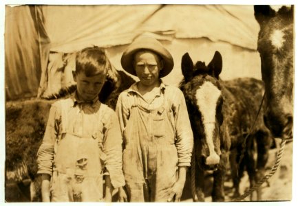 A pair of truants, tending their father's mules. Photo taken during school hours, near Oklahoma City. Boys are 9 and 11 yrs. old. LOC nclc.00665