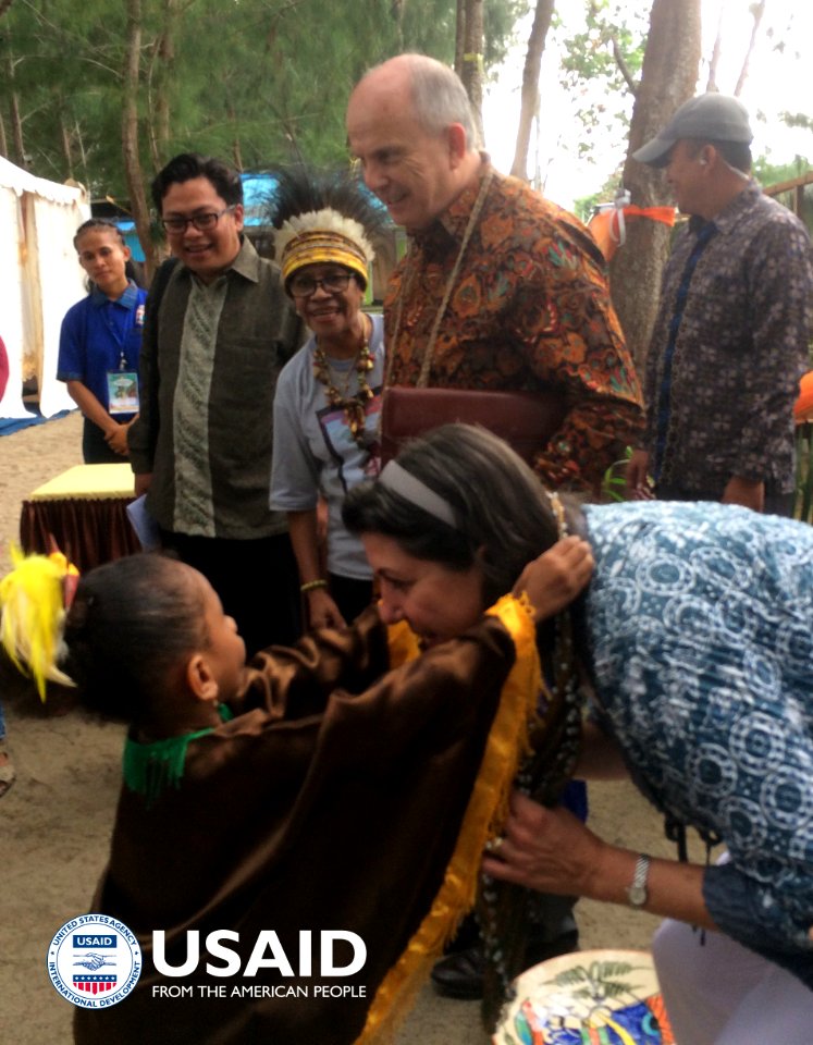 A Papuan girl welcomes USAID Mission Director to USAID project launch to help eastern Indonesia reduce gender-based violence. (34506831132)