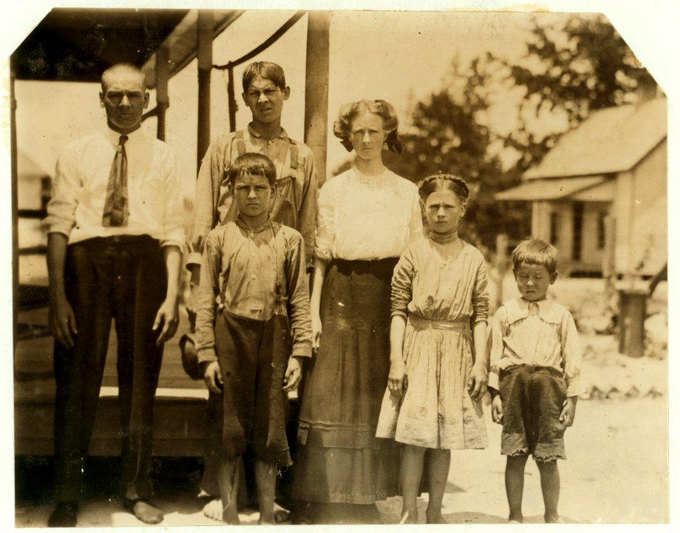 A part of the Hopkins family. All of these (and 'except the least one') in the mill. Belton Mfg. Co. The two girls together run 10 sides $1.10 a day. The little girl apparently not 12 years LOC nclc.02619