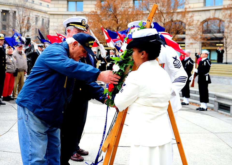 A Pearl Harbor survivor lays a wreath. (8264507440)