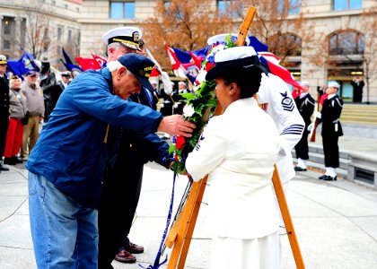 A Pearl Harbor survivor lays a wreath. (8264507440)