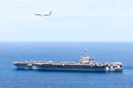 A P-8A Poseidon flies above the aircraft carrier USS Harry S. Truman. (19182222761)