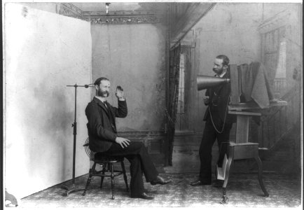 A photographer appears to be photographing himself in a photographic studio) - Wheeler, Berlin, Wis LCCN2004681684
