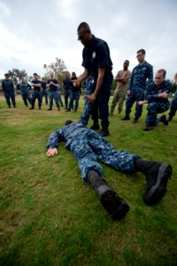 A police instructor teaches a takedown hold. (8233129428)