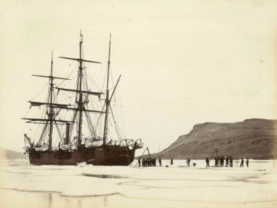 A port stern quarter view of 'Alert' (1856) alongside the ice floe, with the crew cutting an ice dock in Dobbin Bay. RMG B3669-N