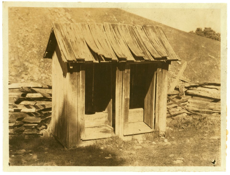 A poor toilet, of the old style at Buzzard School. These will be replaced later by concrete toilets. LOC nclc.04357