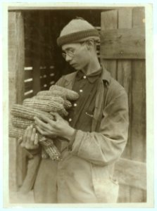A Product of the 4 H. Club. Gradie Walton, 17 yrs. old, - is very deficient in most school branches (except in mathematics where he shines). He is much handicapped physically, - lost one eye LOC nclc.04377
