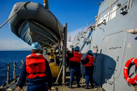 A RHIB is deployed on the USS McCampbell DDG-85, 140117-N-IP531-059