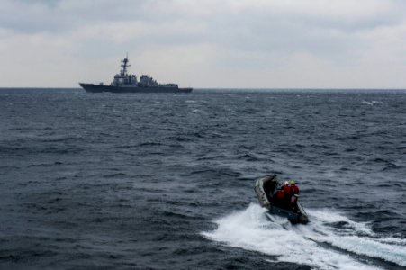 A rigid-hull inflatable boat transfers personnel. (16913886418)