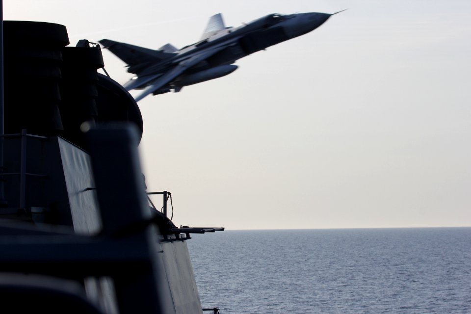 A Russian Sukhoi Su-24 attack aircraft flies over USS Donald Cook. (26426606725)
