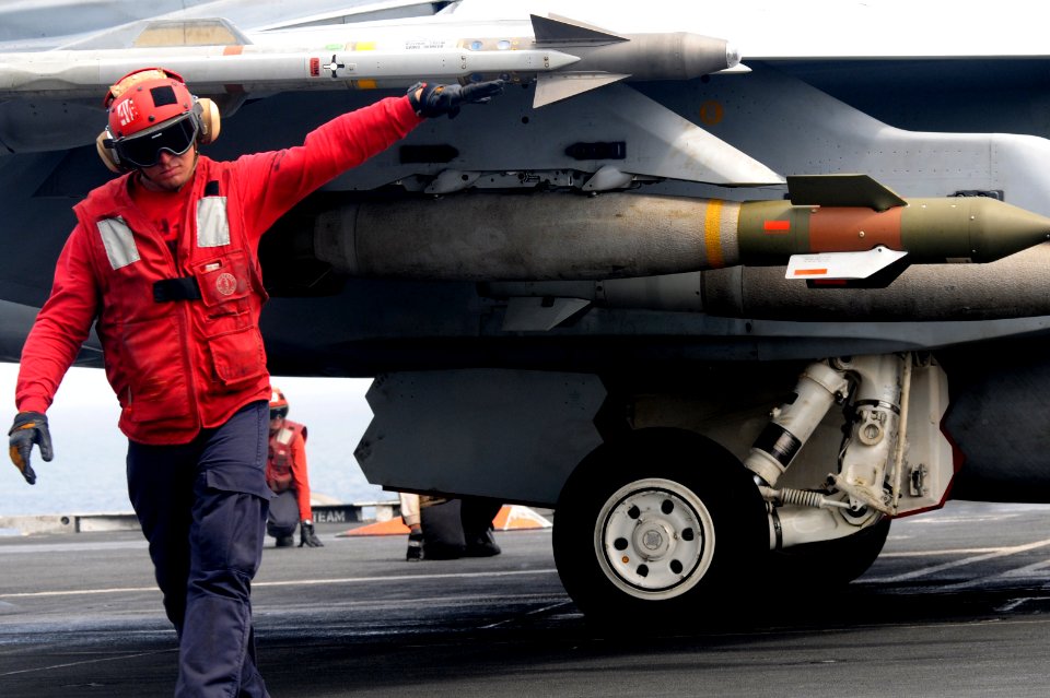 A Sailor checks ordnance aboard USS George H.W. Bush (6147276516)