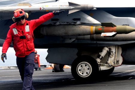 A Sailor checks ordnance aboard USS George H.W. Bush (6147276516)