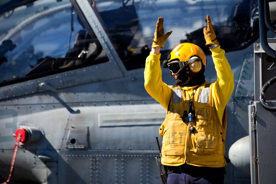 A Sailor directs aircraft aboard USS Kearsarge. (8475342721)