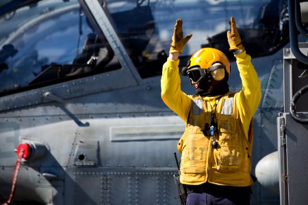 A Sailor directs aircraft aboard USS Kearsarge. (8475342721)