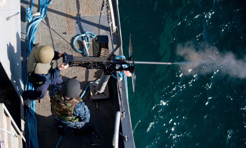 A Sailor fires a .50-caliber machine gun. (6852043777)