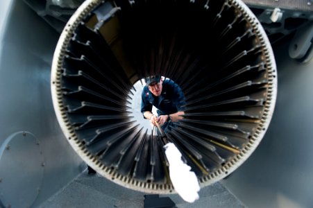 A Sailor cleans a CIWS. (8291330376)