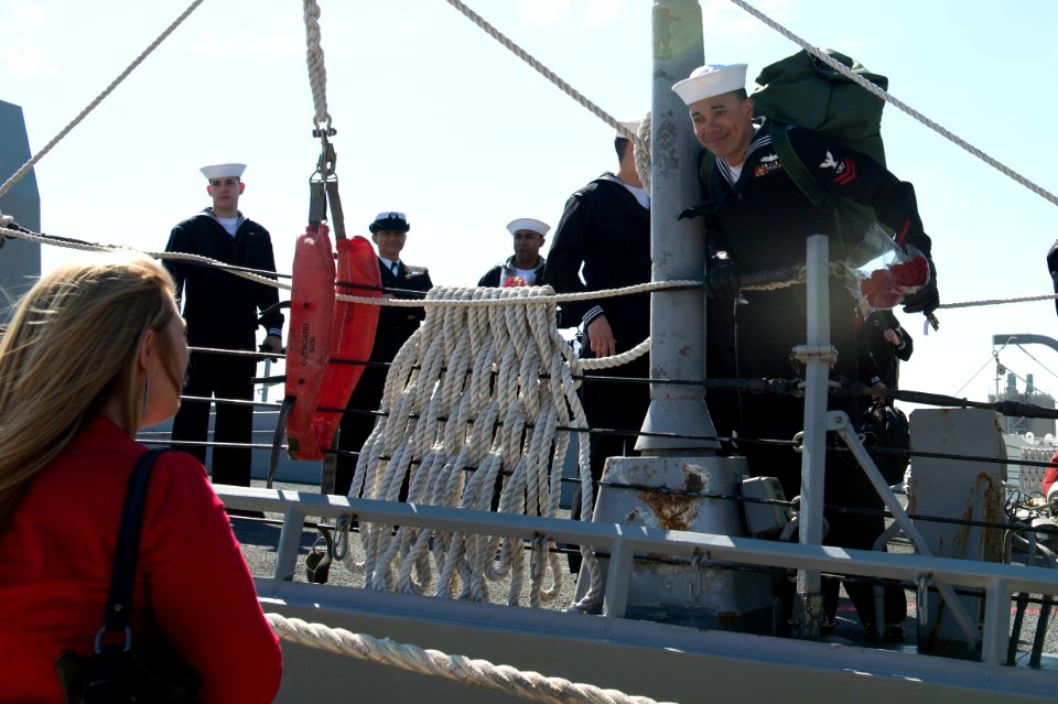 A Sailor greets his girlfriend after nine months at sea. (8600829444)