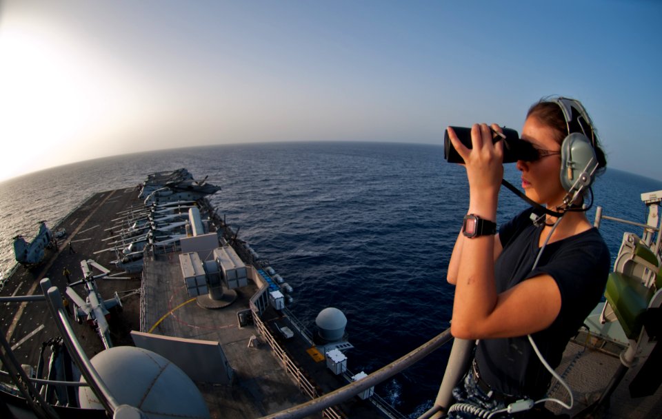 A Sailor investigates a contact during flight operations. (7113454431)