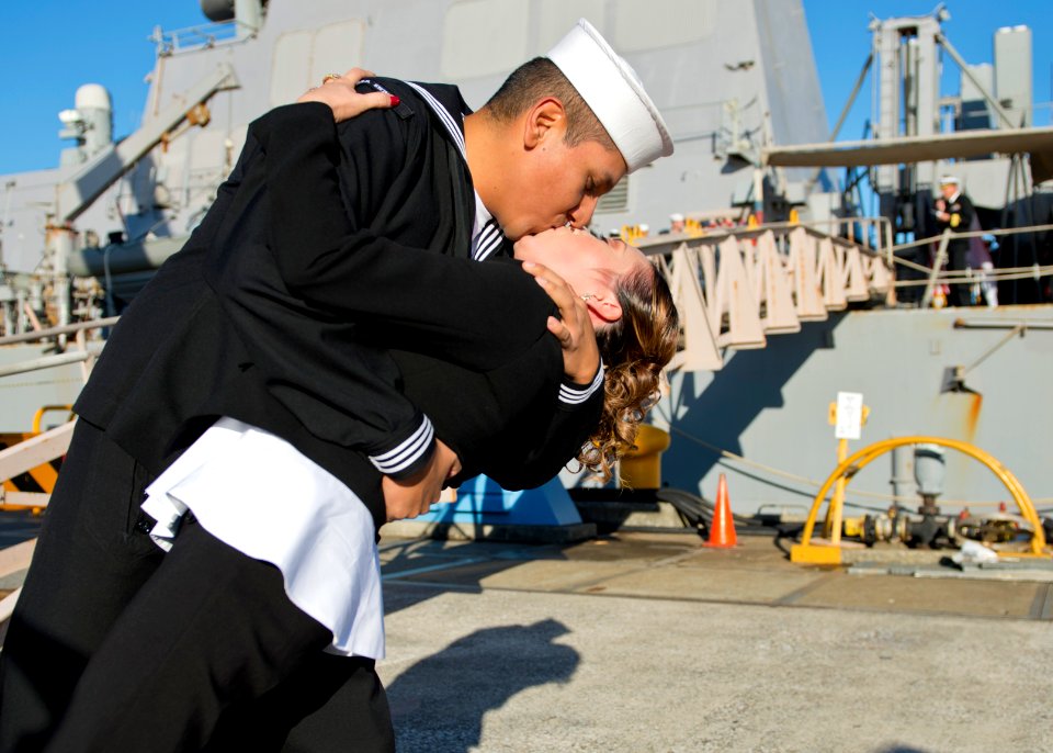 A Sailor kisses his wife upon returning to Japan. (8199144059)
