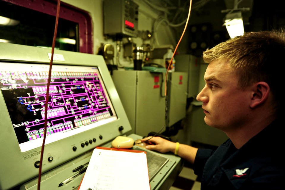 A Sailor monitors fuel aboard USS Carl Vinson. (8475344419)
