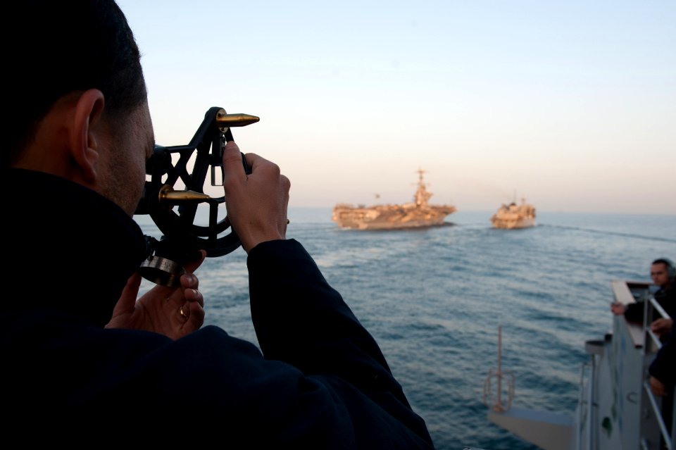 A Sailor measures distance at sea. (8357467583)