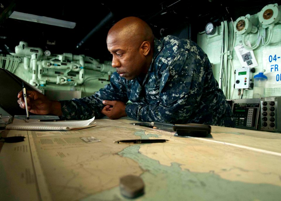 A Sailor plots a course for USS New York. (8264506204)