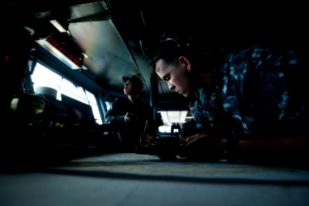 A Sailor plots the position of USS Carl Vinson at sea. (8446975219)