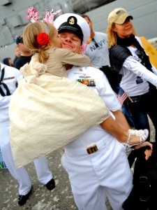 A Sailor hugs his daughter. (8243543425)