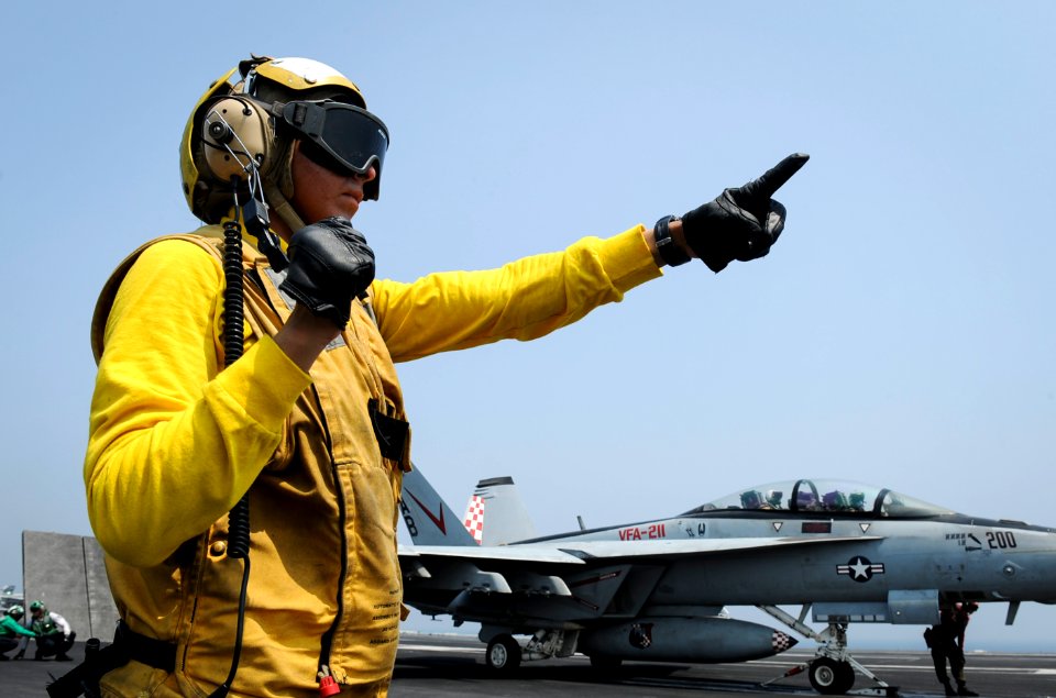 A Sailor prepares aircraft for launch. (20891663952)