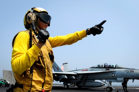 A Sailor prepares aircraft for launch. (20891663952)