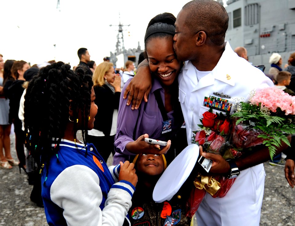 A Sailor kisses his loved ones. (8244609818)