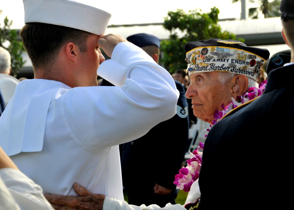 A Sailor salutes a Pearl Harbor survivor. (8263437379)