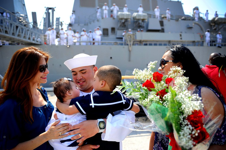 A Sailor sees his newborn daughter for the first time. (7255941134)