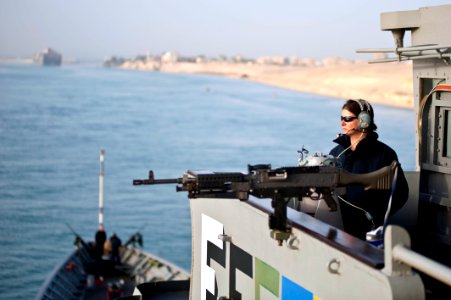 A Sailor stands watch as USS Hue City transists the Suez Canal. (8573732767)