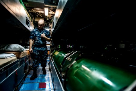 A Sailor stands roving security watch aboard USS North Carolina. (14368345056)