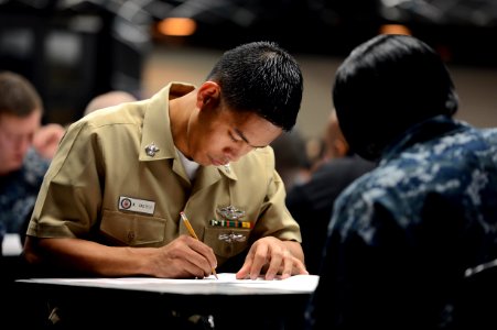 A Sailor takes his advancement exam. (8407483271)