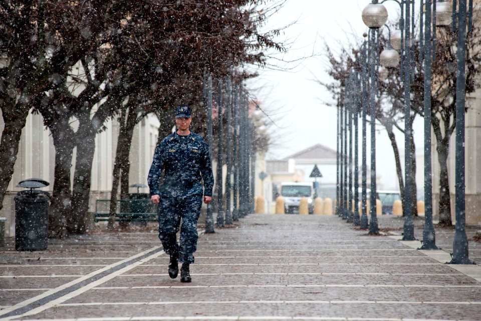 A Sailor walks through snow in Naples. (16478080466)