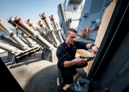 A Sailor works aboard USS Stockdale. (8498338908)
