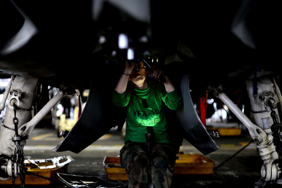 A Sailor works on an F-A-18C. (8498337380)