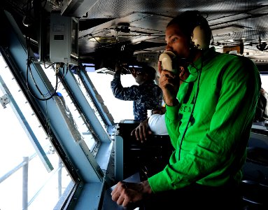 A Sailor works in primary flight control at sea. (8435774590)