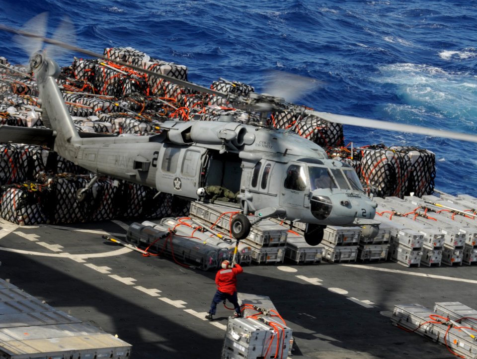 A Sea Hawk helicopter resupplies USS Nimitz. (8695664007)