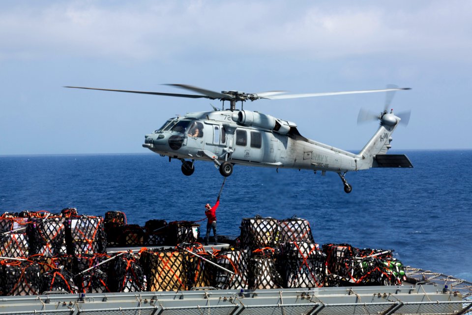 A Sea Hawk picks up cargo at sea. (8719463937)