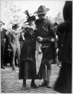 A soldier boy of the 71st Regiment Infantry, New York National Guard, saying good bye to his sweetheart as his... - NARA - 533733 photo