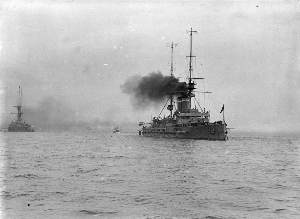 A starboard bow view of HMS 'Dominion' (1903) with 'Hibernia' (1905) in the distance. RMG P00023