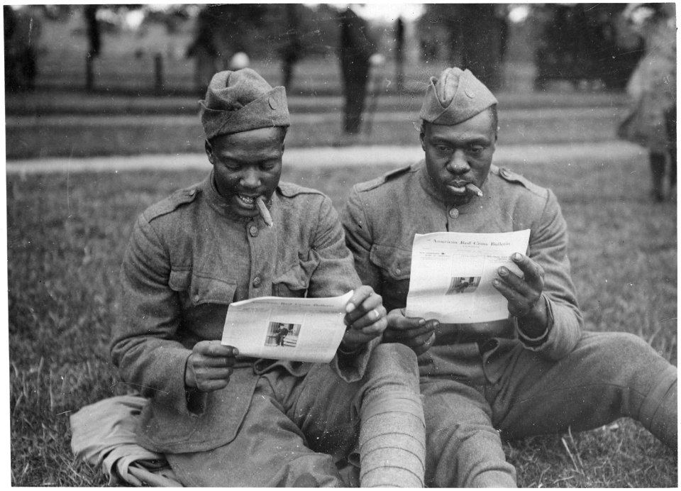 A sunny afternoon in Hyde Park, with the London Bulletin of the American Red Cross for company. - NARA - 533608